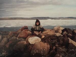 Nora sitting atop ancient Thule ruins on Ellesmere Island